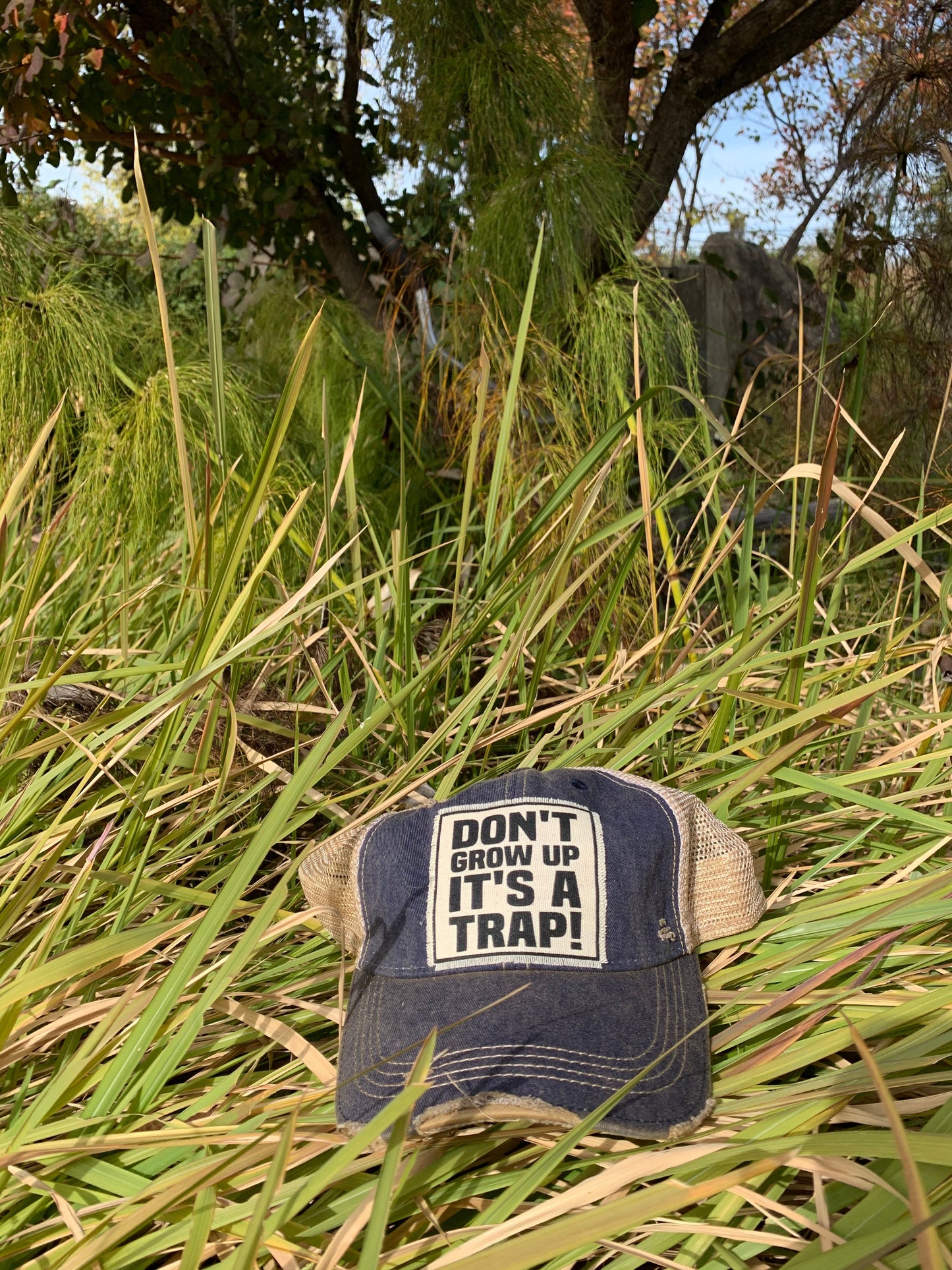 "Don't Grow Up It's A Trap" Distressed Trucker Cap
