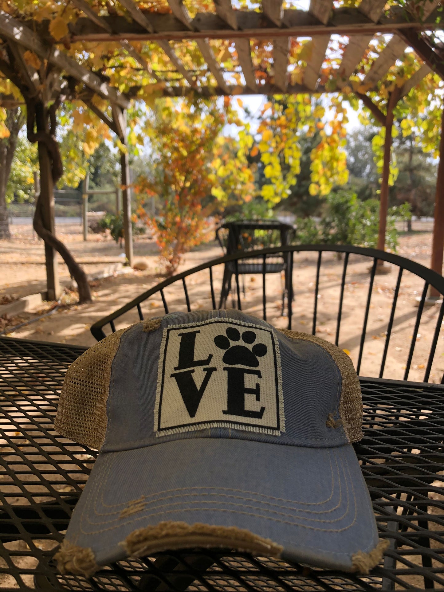 "LOVE (Paw)" Distressed Trucker Cap