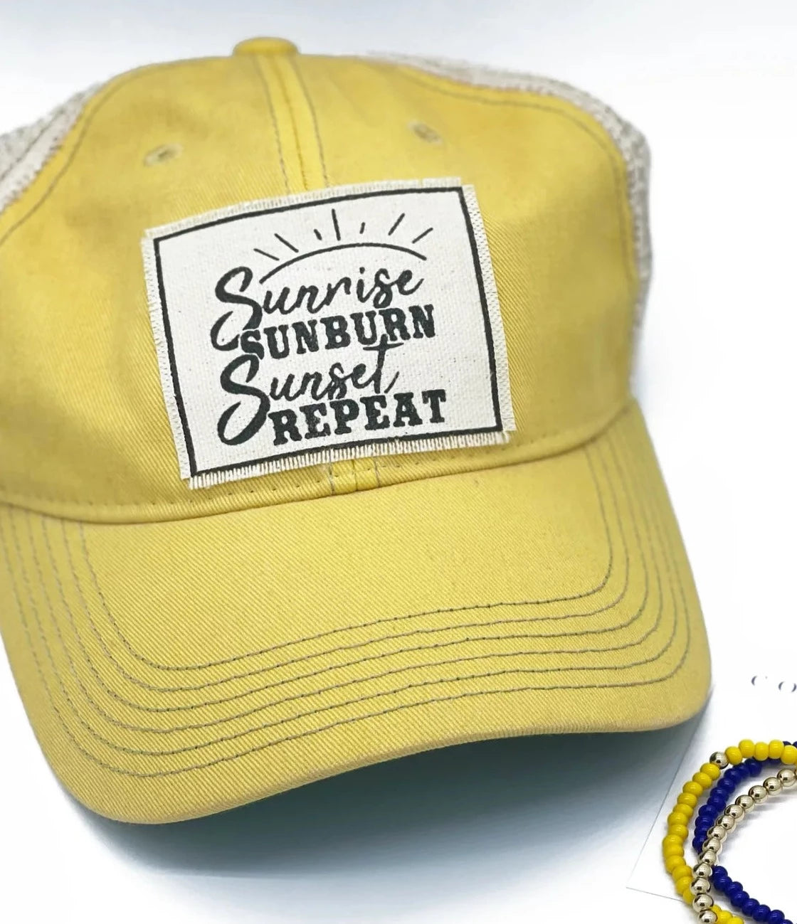 "Sunrise Sunburn Sunset Repeat" Distressed Trucker Cap