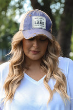 "What Happens At The Lake Stays At The Lake" Distressed Trucker Cap