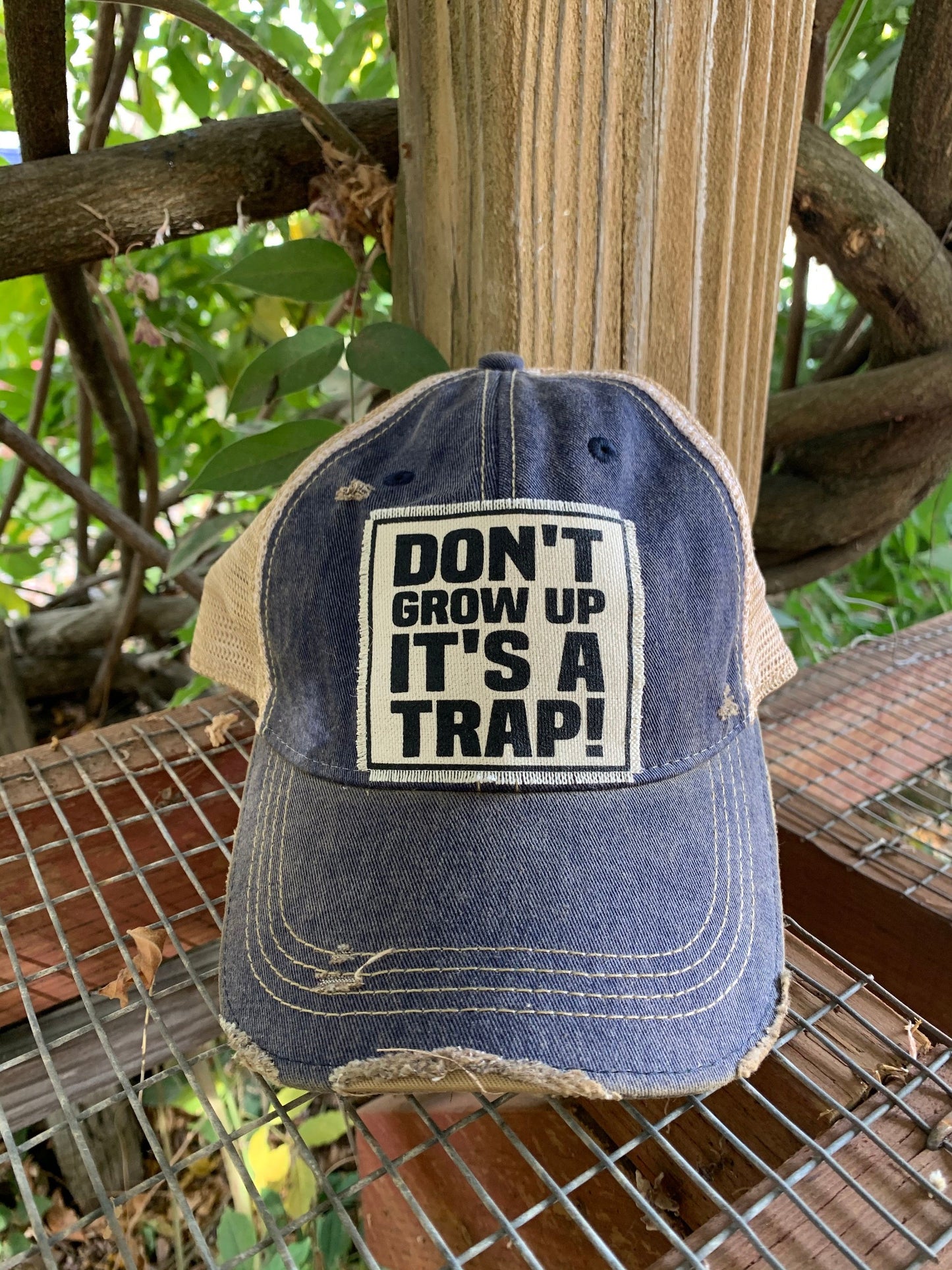 "Don't Grow Up It's A Trap" Distressed Trucker Cap