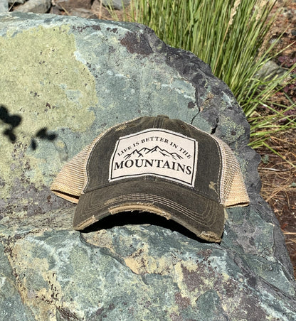 "Life Is Better In The Mountains"" Distressed Trucker Cap