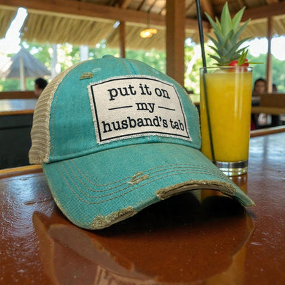 "Put It On My Husband's Tab" Distressed Trucker Cap